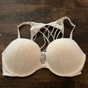 White Victoria’s Secret lace bra with corset looking back. Size 36D front snap.